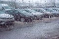 Winter 2021, Queens of MO, parking, raindrops on the window pane, cars waiting for their owners, iron horses. Royalty Free Stock Photo