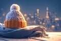 Winter readiness Hat on a house background, symbolizing warmth