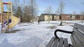 Winter recreation area for children. Slide-play equipment in the playground