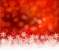 Winter red bokeh xmas background with snowflakes. Christmas bokeh holiday decoration for greeting card Royalty Free Stock Photo