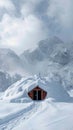 Winter refuge Snow covered alpine emergency shelter with text space