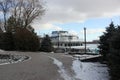 Winter river covered with ice with blue cloudy sky Royalty Free Stock Photo