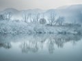 Winter river in the early misty morning and mountains Royalty Free Stock Photo