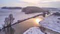 Winter river landscape, snow covered fields. Hoarfrost on trees, plants. Frosty morning. Sunny cloudy Misty weather. Cold season. Royalty Free Stock Photo