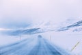 Winter road in Iceland in the mountains, icy slippery