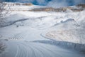 Winter road landscape of snow-covered cliffs of the plateau in the North Caucasus through the branches of a tree covered Royalty Free Stock Photo