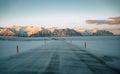 Winter road in snow blizzard. Blowing snow across the road. Difficult driving conditions in winter season in Iceland Royalty Free Stock Photo