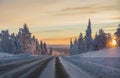 Winter road at sunset Royalty Free Stock Photo