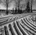 Winter road with traces of car tire tread Royalty Free Stock Photo