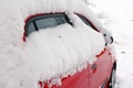 Winter in road traffic - A snowed car Royalty Free Stock Photo