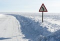 Winter road under blue sky Royalty Free Stock Photo