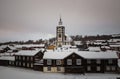 Winter in Roros, original mining town. Snow covered roofs of old Royalty Free Stock Photo