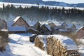 Winter rural landscape - mountain village covered with snow .