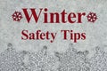 Winter Safety Tips message with gray snowflake border