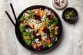 Winter salad with beetroot, oranges, walnuts, pomegranate, dried cranberries