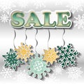 Winter sale background with bright snowflakes