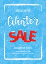 Winter sale banner, poster, flyer template in the frame of snow on blue snowflakes background. Special seasonal offer. Royalty Free Stock Photo