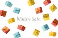 Winter sale concept with gift boxes flying over white background Royalty Free Stock Photo