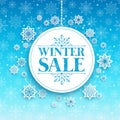 Winter Sale Text in White Space with Snow Flakes Royalty Free Stock Photo