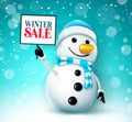 Winter sale vector design. Winter sale text with snowman character holding placard sign element for snow season shopping promotion Royalty Free Stock Photo