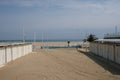 Winter sandy beach in Rimini, Italy. Empty during the off season Royalty Free Stock Photo