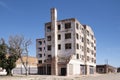 Winter scene of an abandoned hotel in Colorado City, Texas with blue sky