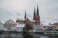 Winter scene of the beautiful city of with a Cathedral of Uppsala near the lake in Sweden Royalty Free Stock Photo