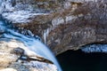 Winter scene of the Desoto Falls cascading over a rocky outcrop in a frosty forest, Alabama Royalty Free Stock Photo