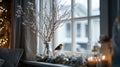 Winter scene with robin bird perched on window sill beside festive decorations and candles Royalty Free Stock Photo