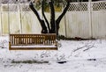 A Winter Scene of a Swing Bench