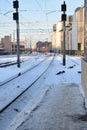 Winter scene with train coming to the station Royalty Free Stock Photo