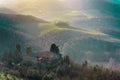Winter Scene of a Tuscan Cottage, Rolling Hills, and Mist Royalty Free Stock Photo