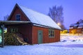 Winter scenery with cottage wooden house in Sweden at night