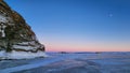 Winter sea sunset. Panoramic view of the snow-covered shore of the frozen sea, the lake at sunset. Shards of ice close-up. Royalty Free Stock Photo