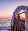 Sun between ice window Royalty Free Stock Photo