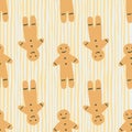 Winter seamless doodle pattern with gingerbread man hand drawn cookies silhouettes. Orange colored dessert on stripped background