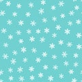 Winter seamless pattern. Drawn by hand. White snowflakes on blue background. Royalty Free Stock Photo