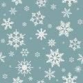 Winter seamless pattern with flat white snowflakes on powder blue background. Royalty Free Stock Photo