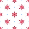 Cute Christmas background with red snowflakes and blue dots on white backdrop. Royalty Free Stock Photo