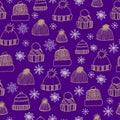 Winter seamless pattern with hand drawn knitted hats and snowflakes on a purple background