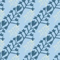 Winter seamless pattern with navy blue elements and pastel blue background. Little yellow floral elements