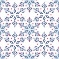 Winter seamless pattern of snowflakes blue with red decorations on white background Royalty Free Stock Photo