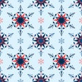 Winter seamless pattern of snowflakes geometric shape of red and blue Royalty Free Stock Photo