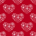 Winter seamless pattern with snowflakes heart on red background Royalty Free Stock Photo