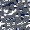 Winter seamless pattern with winter accessories: hats and scarves on grey background. Cute vector winter warm knitted Royalty Free Stock Photo