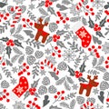 Winter seamless vector pattern with holly berries, candy, deer, christmas socks. Part of Christmas backgrounds collection. Can be Royalty Free Stock Photo