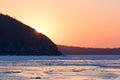 Winter seascape with ice floes on the water surface. Royalty Free Stock Photo