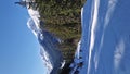 Winter season at Bansko ski resort in Bulgaria with a view to the skiers having fun