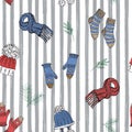 Winter season doodle clothes seamless pattern. Hand drawn sketch elements warm socks, gloves and hats. striped vector background Royalty Free Stock Photo
