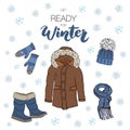 Winter season set doodle elements. Hand drawn sketch colection with boots, warm clothes, socks, gloves, coat and hat. Lettering wi Royalty Free Stock Photo